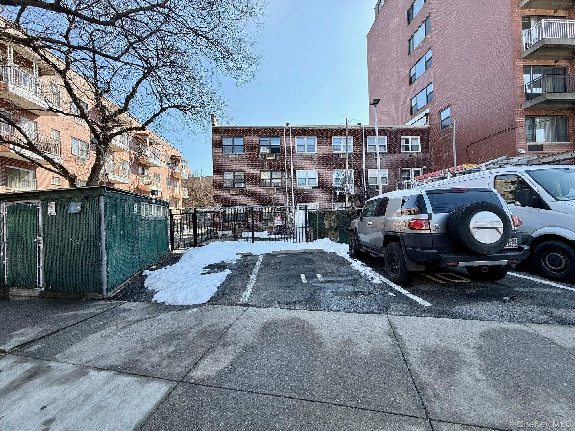 87-14 57th Road, Unit 5A Queens, NY 11373 - Photo 28 of 34 a view of a street with cars
