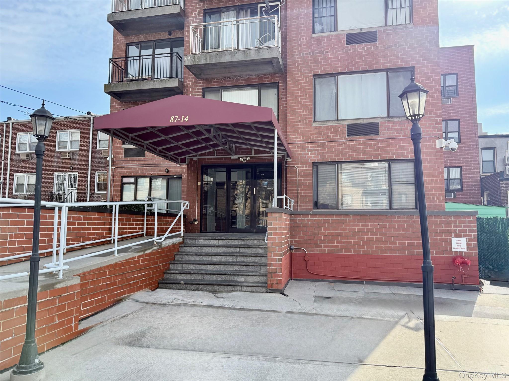 87-14 57th Road, Unit 5A Queens, NY 11373 - Photo 30 of 34 a front view of a building