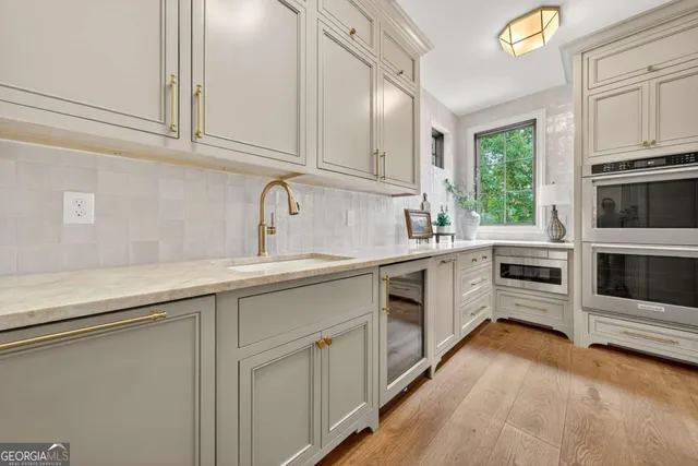 a view of a backyard with sitting area