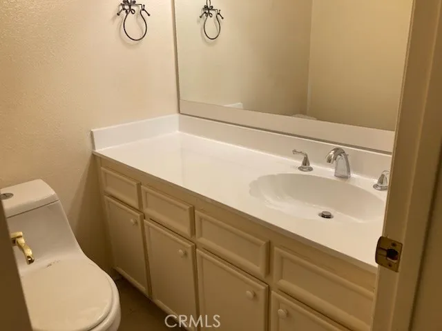 a bathroom with a sink and a toilet