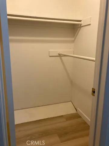 a view of small space with racks on the wall