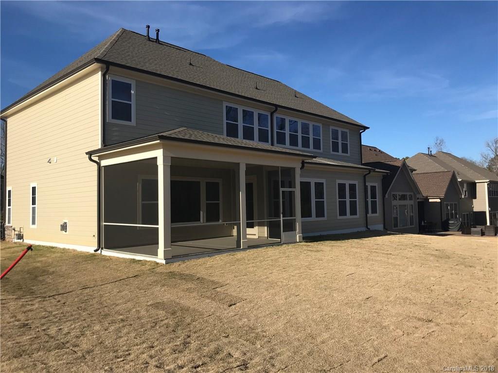 1342 Afton Way, Unit 121 Fort Mill, SC 29708 - Photo 2 of 12 a front view of a house with a yard
