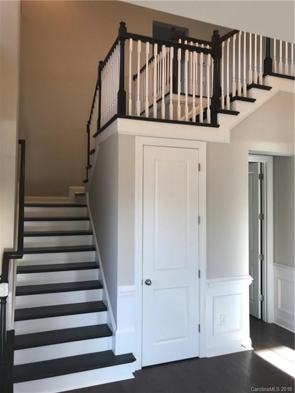 1342 Afton Way, Unit 121 Fort Mill, SC 29708 - Photo 4 of 12 a view of entryway with wooden floor and stairs