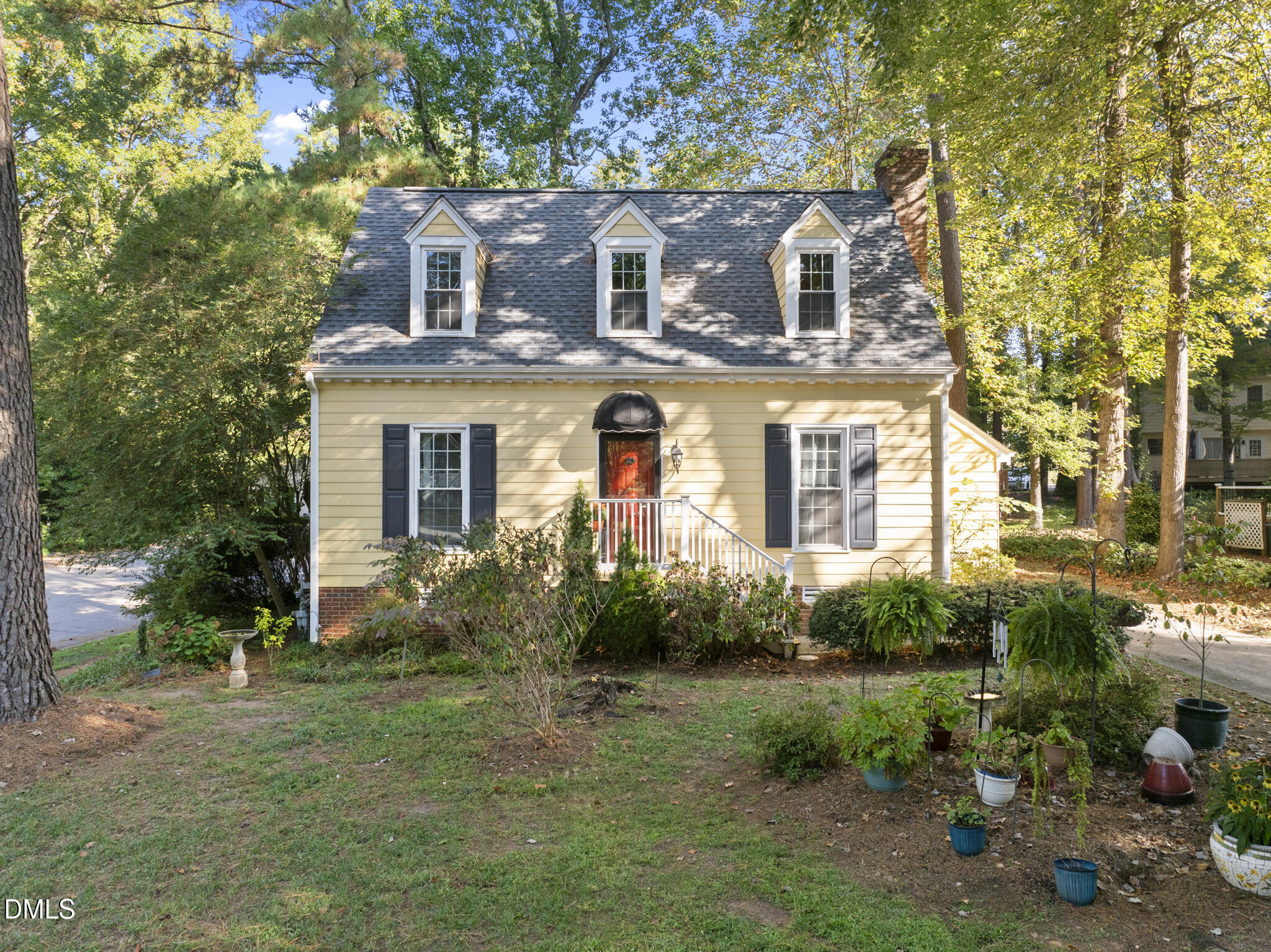 4424 Tetbury Place Raleigh, NC 27613 - Photo 1 of 27 front view of a house with a yard