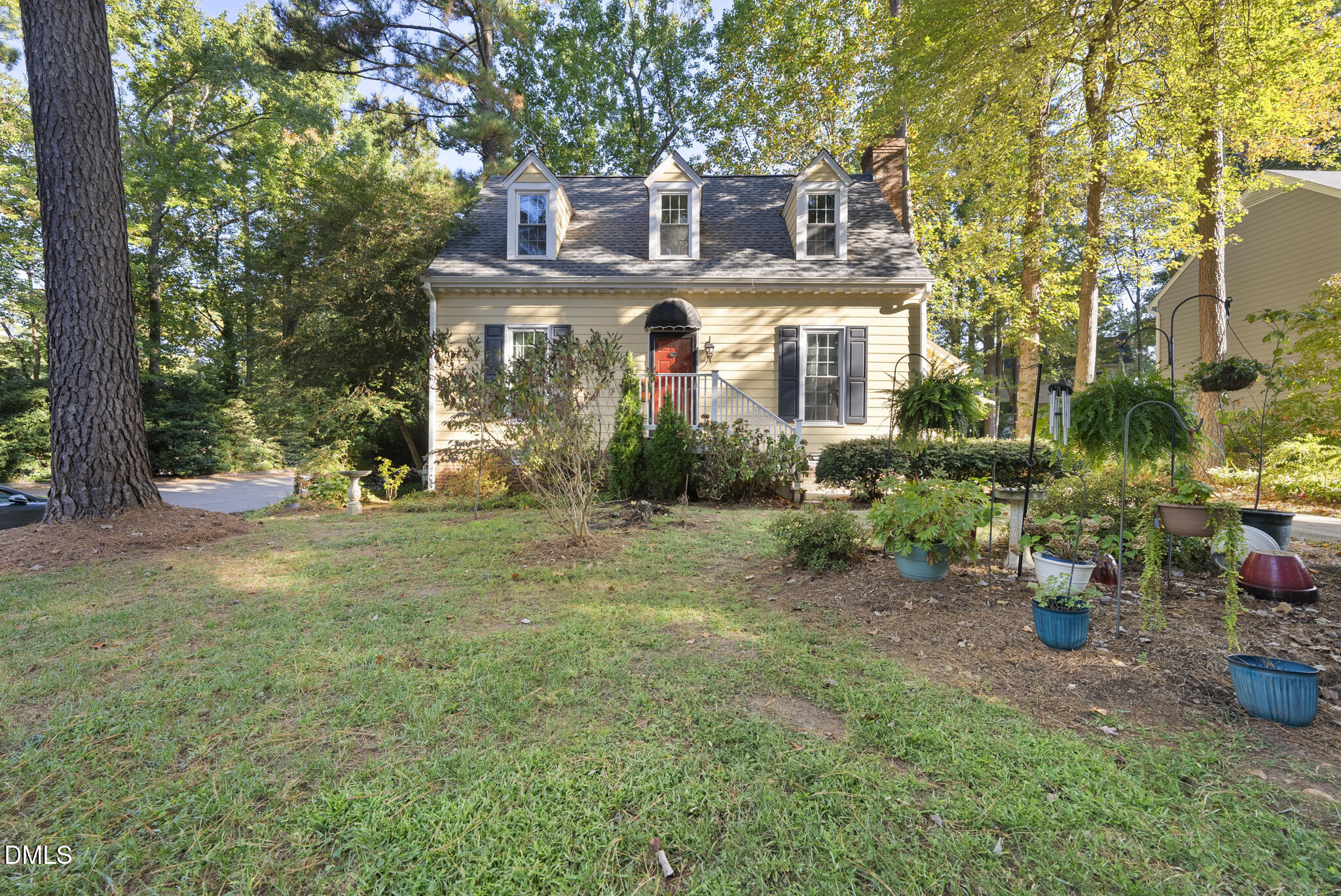 4424 Tetbury Place Raleigh, NC 27613 - Photo 23 of 27 a front view of a house with porch