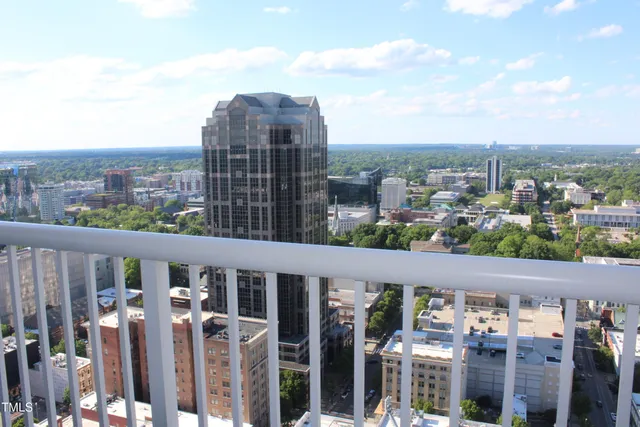 a view of a city from a balcony