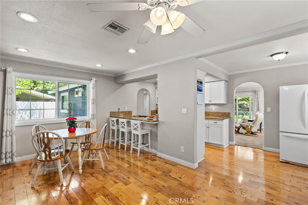 26450 Ridge Vale Drive Newhall, CA 91321 - Photo 13 of 40 a view of a dining room with furniture window and outside view