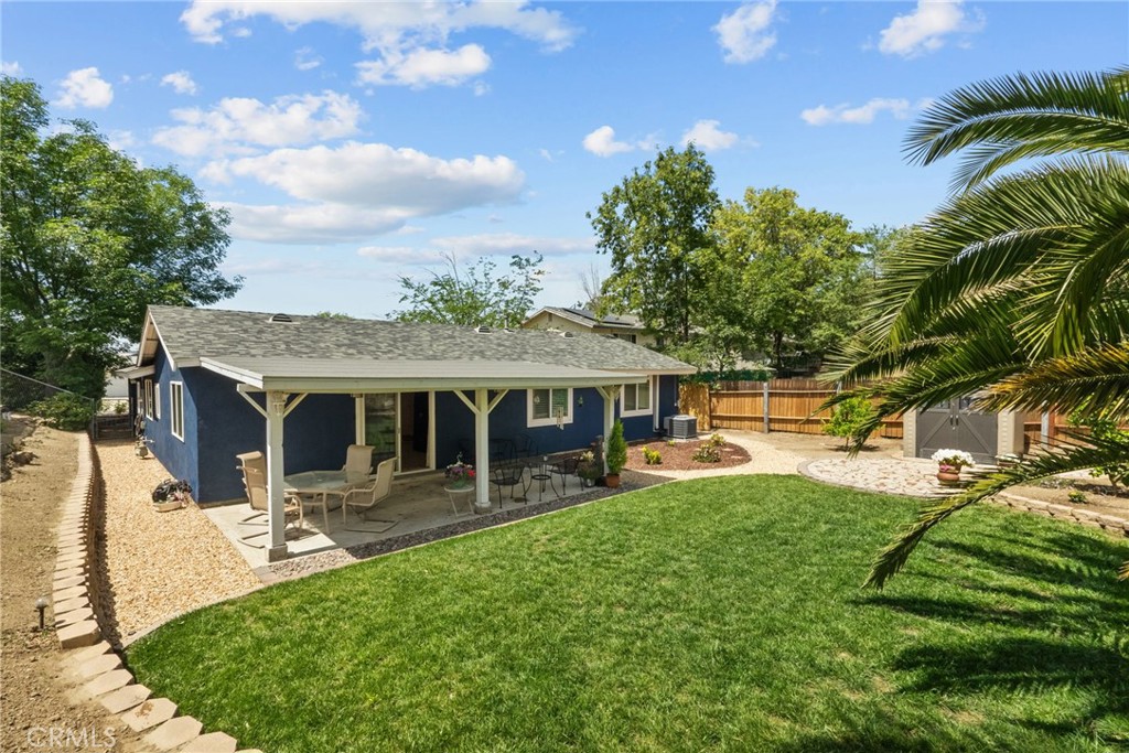 26450 Ridge Vale Drive Newhall, CA 91321 - Photo 33 of 40 a front view of house with yard and outdoor seating