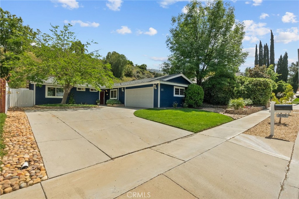 26450 Ridge Vale Drive Newhall, CA 91321 - Photo 38 of 40 a view of house with outdoor space and trees in the background