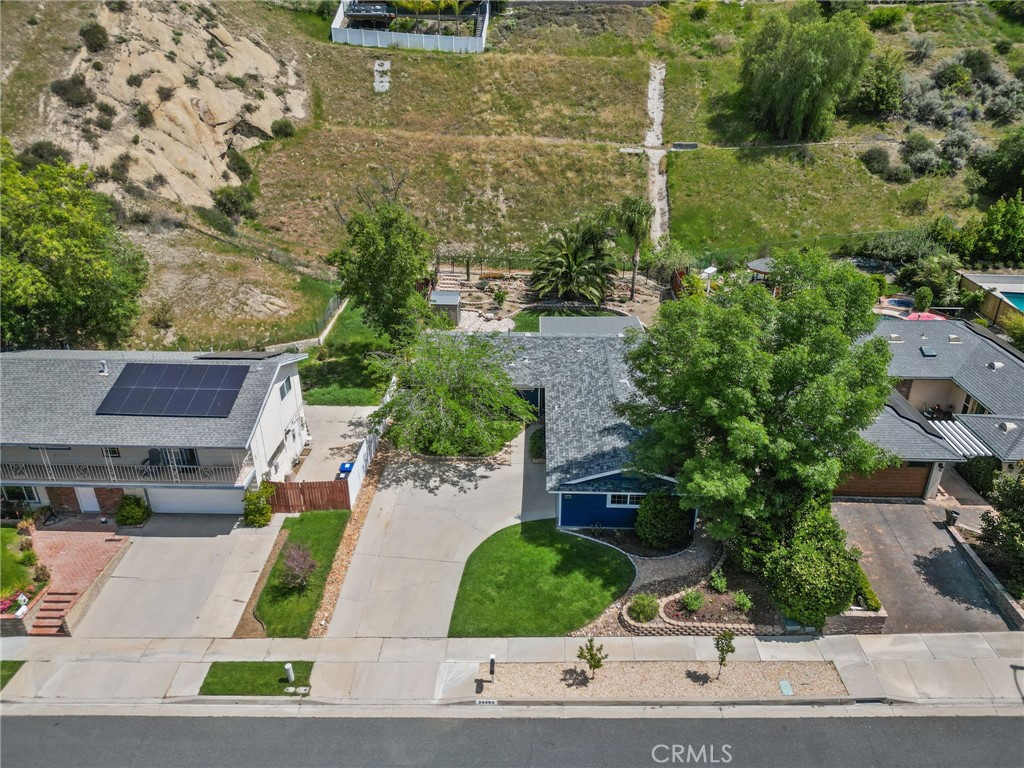 26450 Ridge Vale Drive Newhall, CA 91321 - Photo 39 of 40 an aerial view of a house with a yard and potted plants