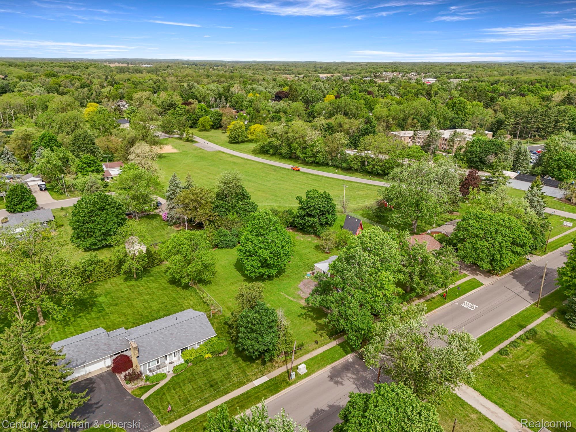 411 South Adrian Street Tecumseh, MI 49286 - Photo 58 of 61 Bird's eye view of a forest