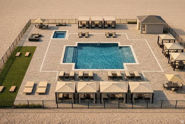 990 Manen Street Washington, UT 84780 - Photo 39 of 43 Resort-style pool area featuring a rectangular swimming pool, integrated spa, and expansive paver patio
