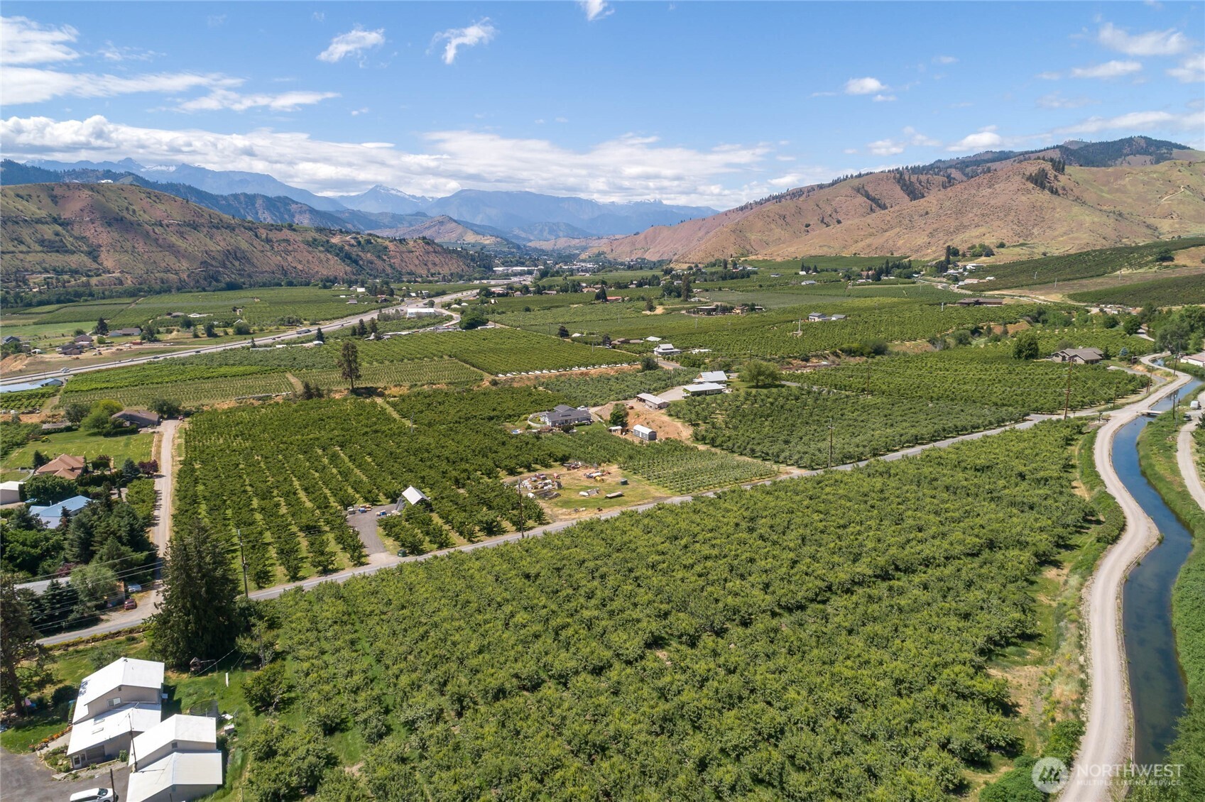 0 Red Apple Road Cashmere, WA 98815 - Photo 1 of 38 a view of a lush green hillside and houses