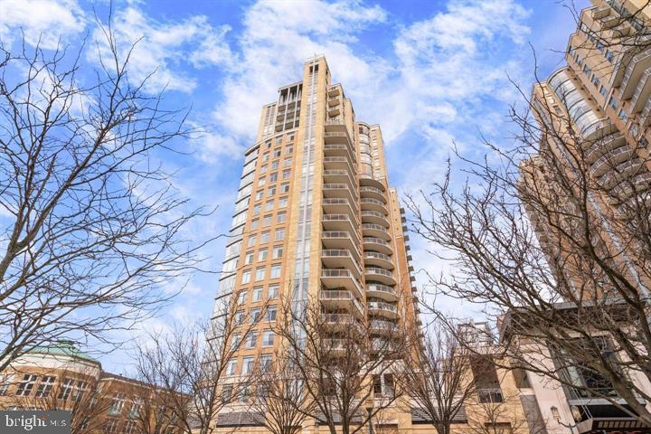 11990 Market Street, Unit 1311 Reston, VA 20190 - Photo 2 of 59 a view of buildings with yard