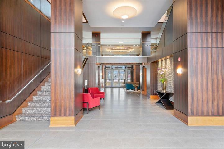 11990 Market Street, Unit 1311 Reston, VA 20190 - Photo 5 of 59 a view of an entryway with a livingroom