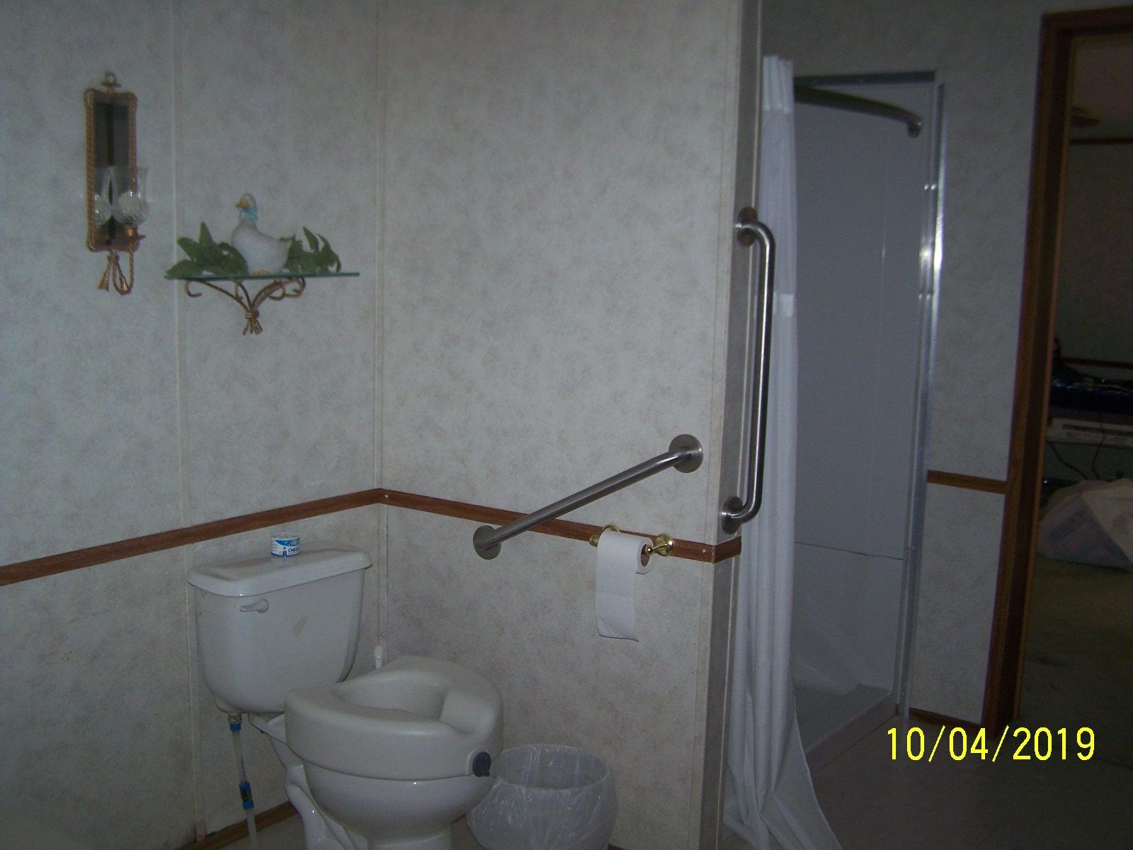 410 Cooper Road Morrison, TN 37357 - Photo 9 of 19 a bathroom with a toilet and a shower
