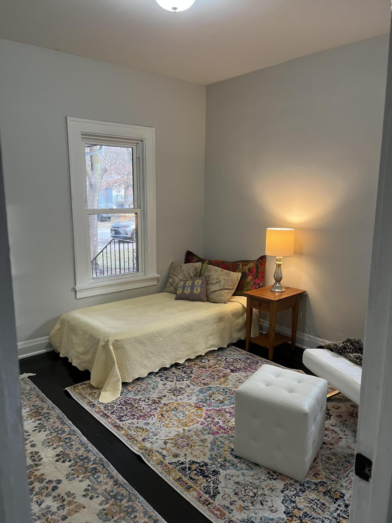 308 South Howard Street Gary, IN 46403 - Photo 14 of 17 a bedroom with a bed and a window