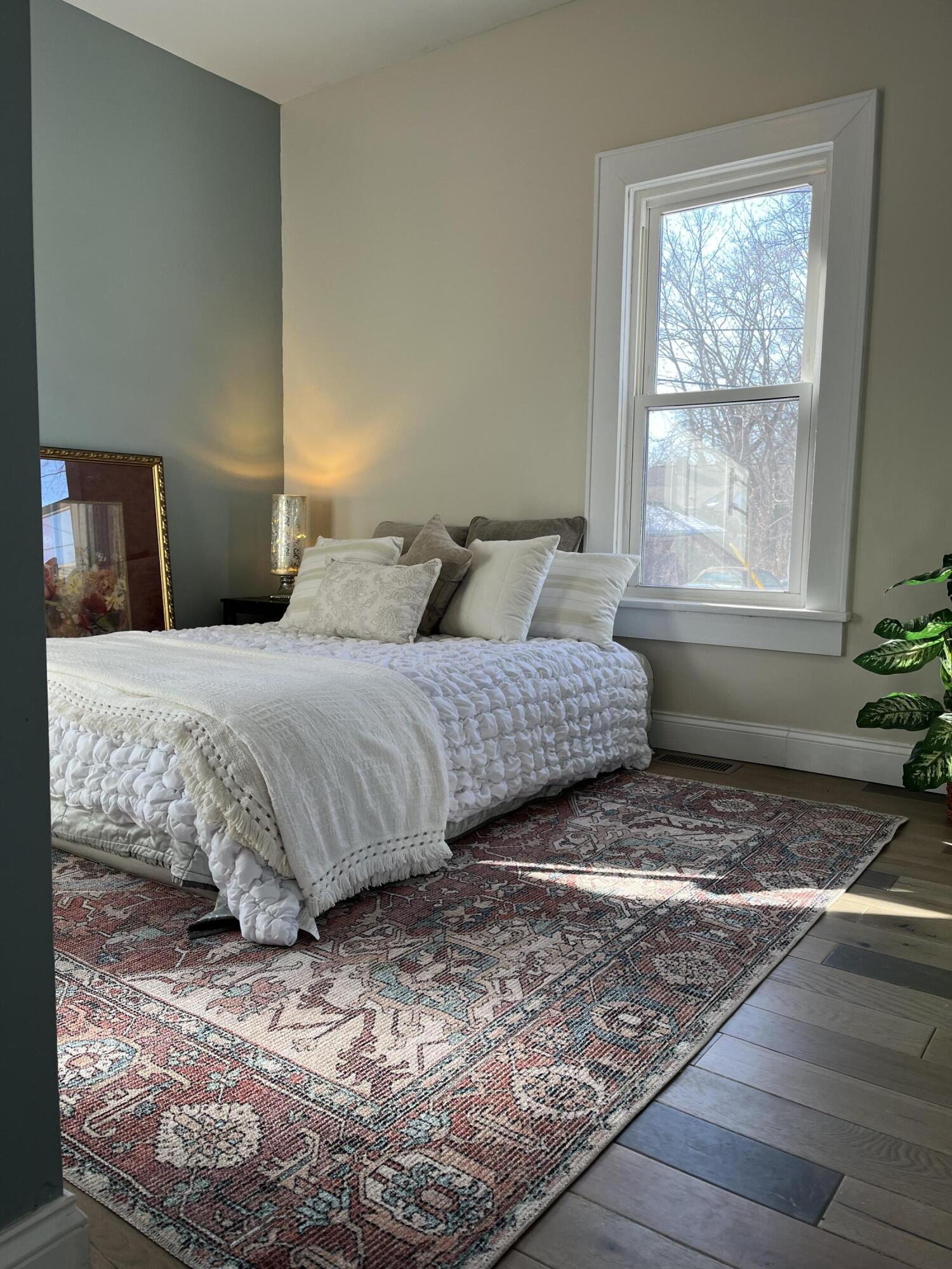 308 South Howard Street Gary, IN 46403 - Photo 17 of 17 a bedroom with a bed and window