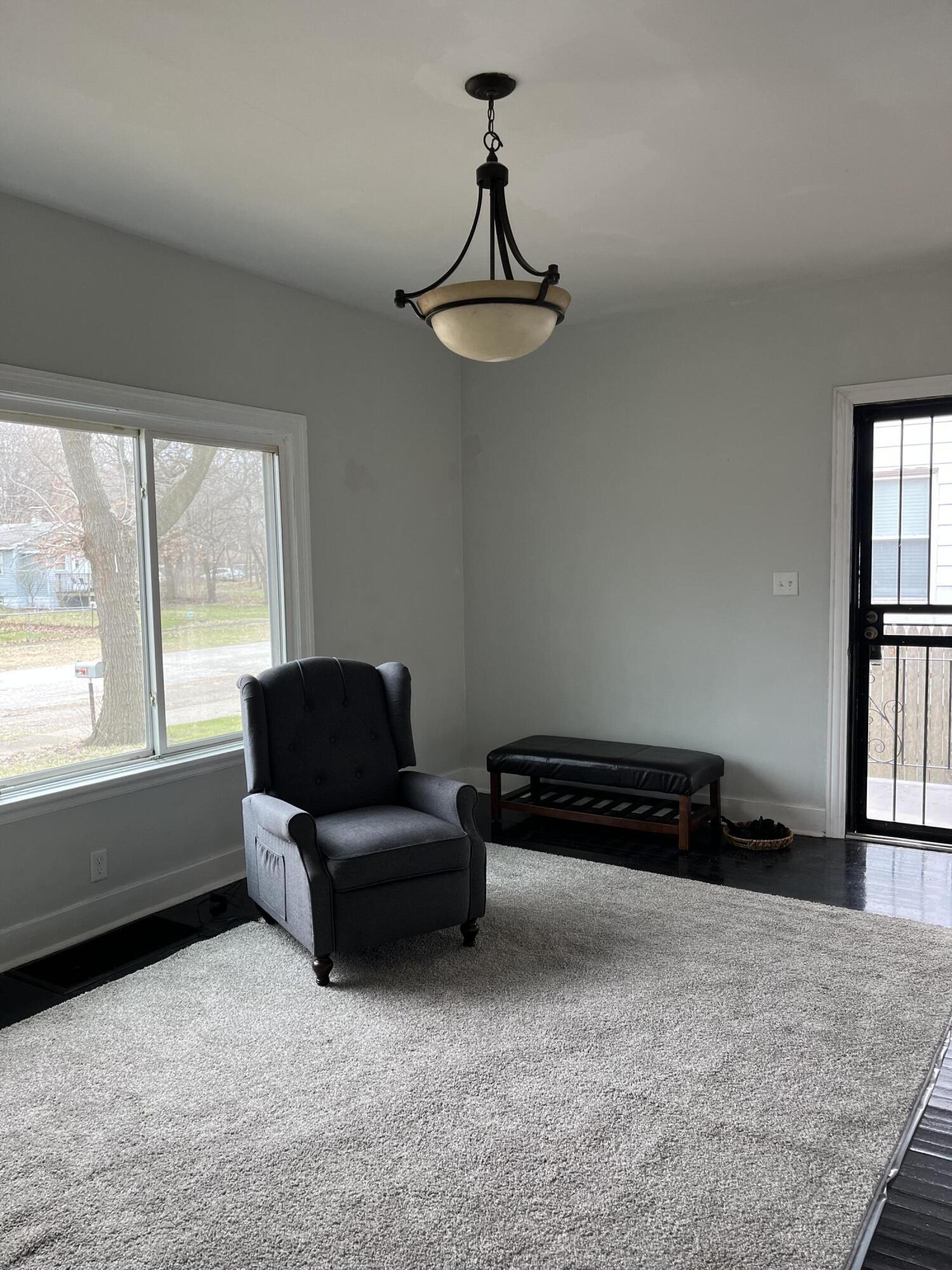 308 South Howard Street Gary, IN 46403 - Photo 10 of 17 a living room with furniture and a window