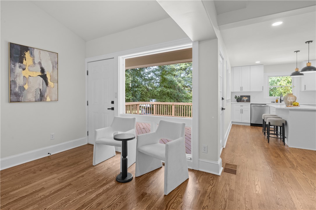251 Riggs Drive Clemson, SC 29631 - Photo 16 of 37 Gleaming hardwood floors and a massive picture window define this inviting open entryway.