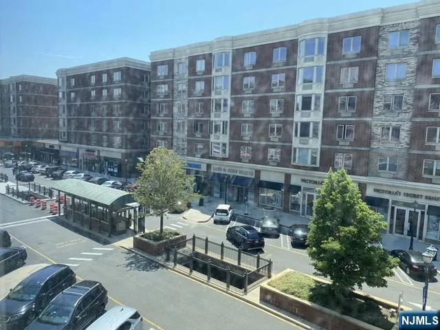 a front view of a building and outdoor space