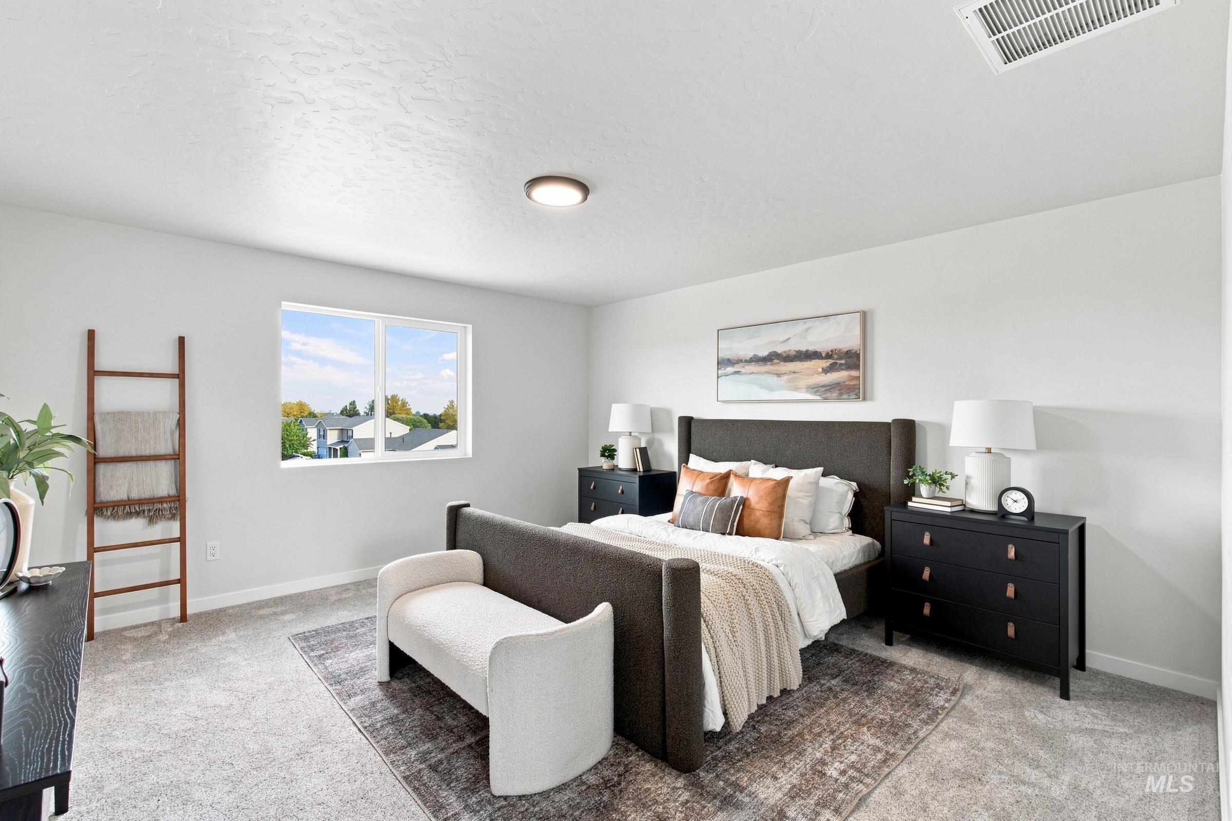 14044 Shiny Spruce Street Caldwell, ID 83607 - Photo 29 of 37 Recessed ceiling light, carpeted flooring, and a large window with exterior views