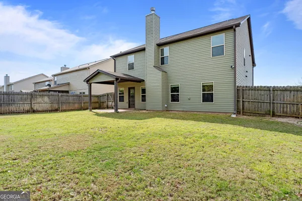 a house view with a outdoor space