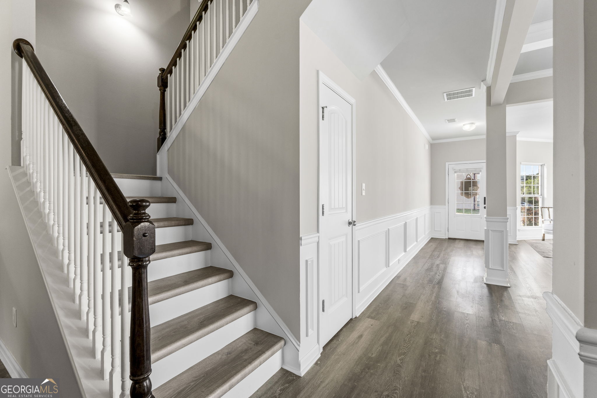 184 Amelia Drive Byron, GA 31008 - Photo 14 of 46 a view of a hallway with wooden floor and entryway