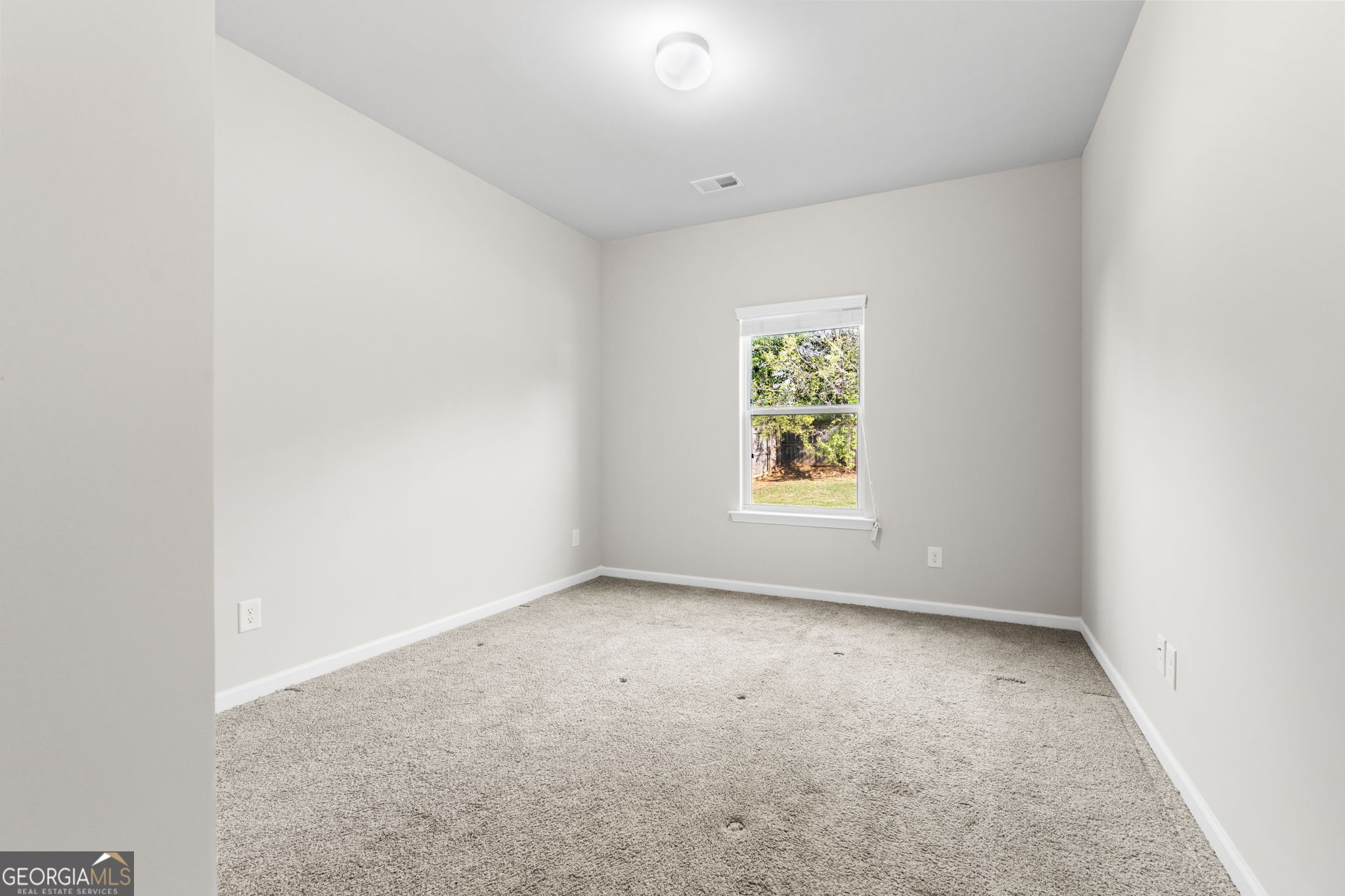 184 Amelia Drive Byron, GA 31008 - Photo 20 of 46 an empty room with windows