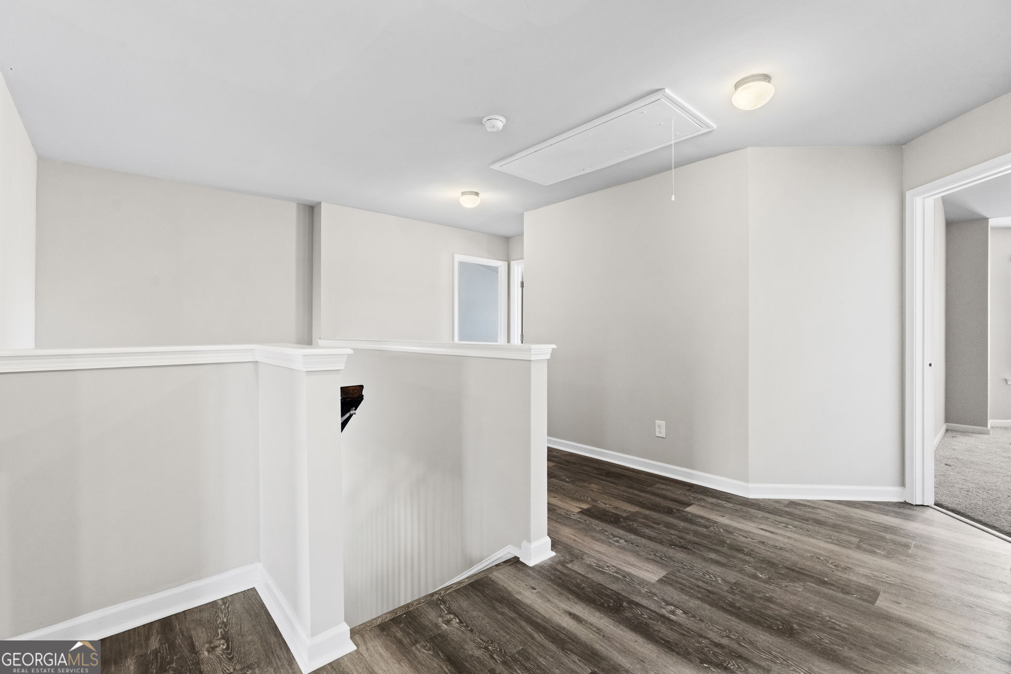 184 Amelia Drive Byron, GA 31008 - Photo 24 of 46 a view of a hallway with wooden floor