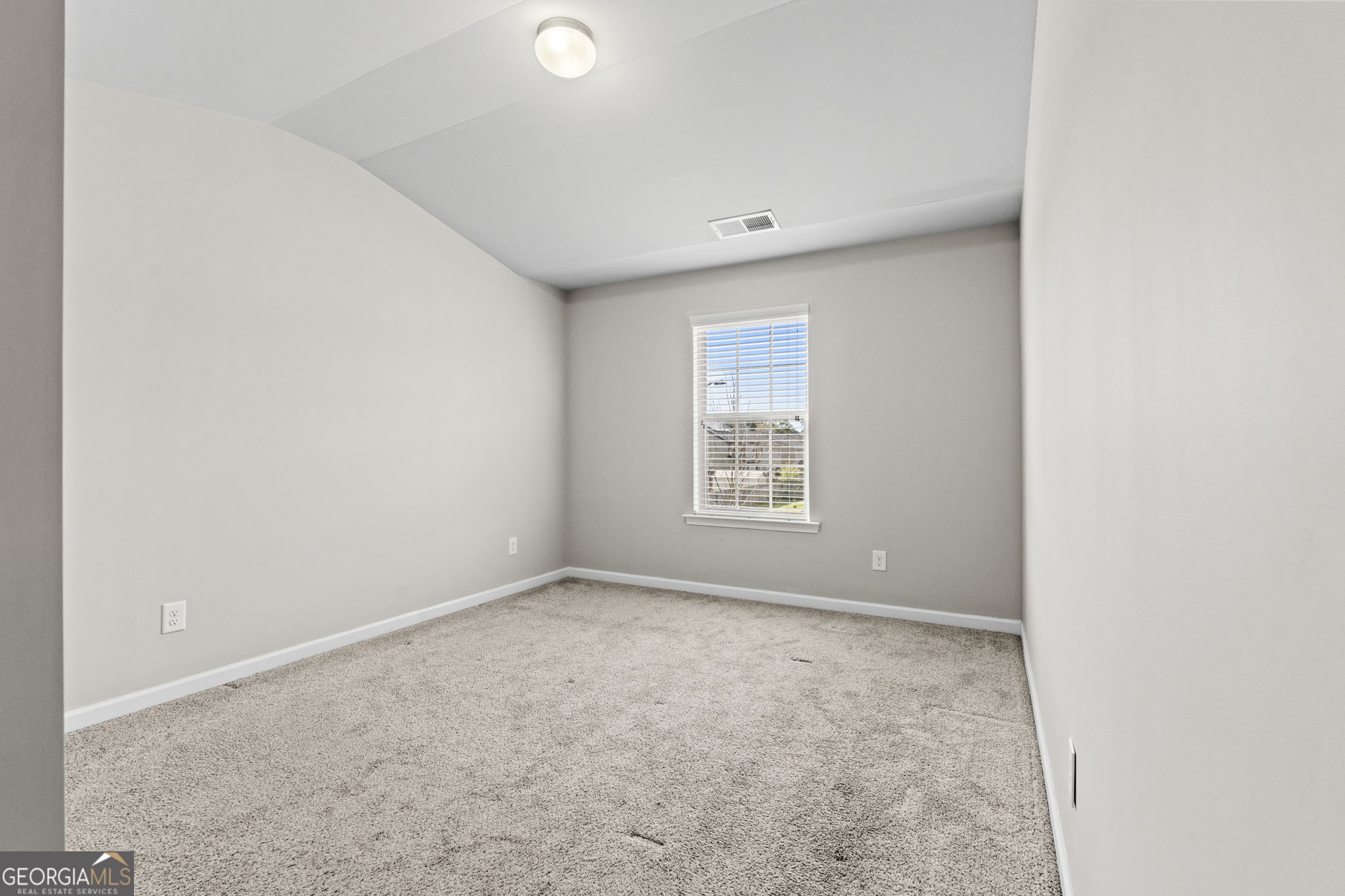 184 Amelia Drive Byron, GA 31008 - Photo 25 of 46 an empty room with windows