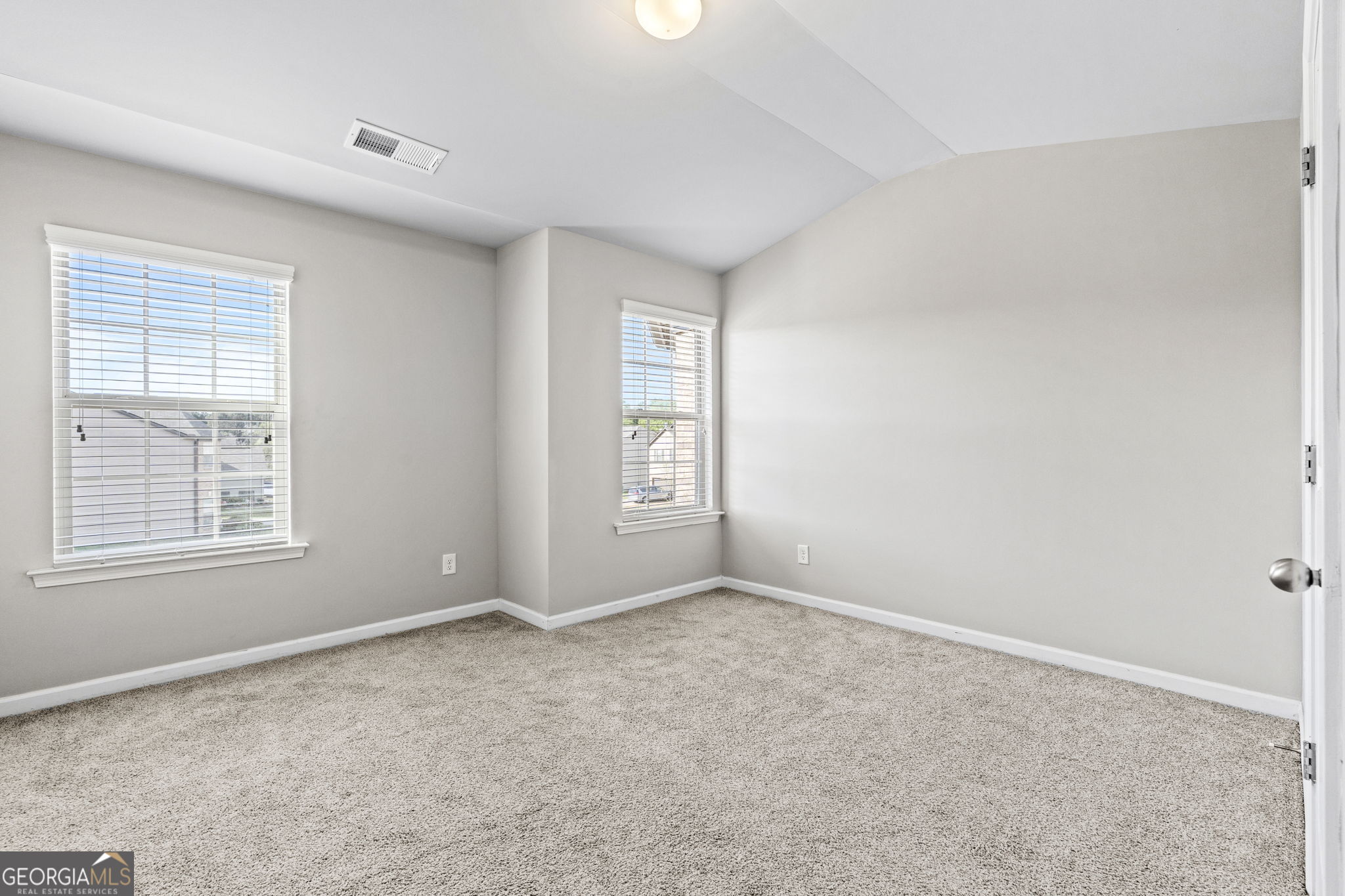 184 Amelia Drive Byron, GA 31008 - Photo 26 of 46 an empty room with windows