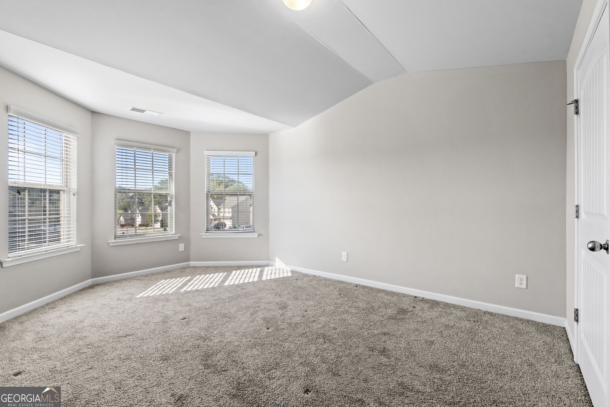 184 Amelia Drive Byron, GA 31008 - Photo 27 of 46 an empty room with windows