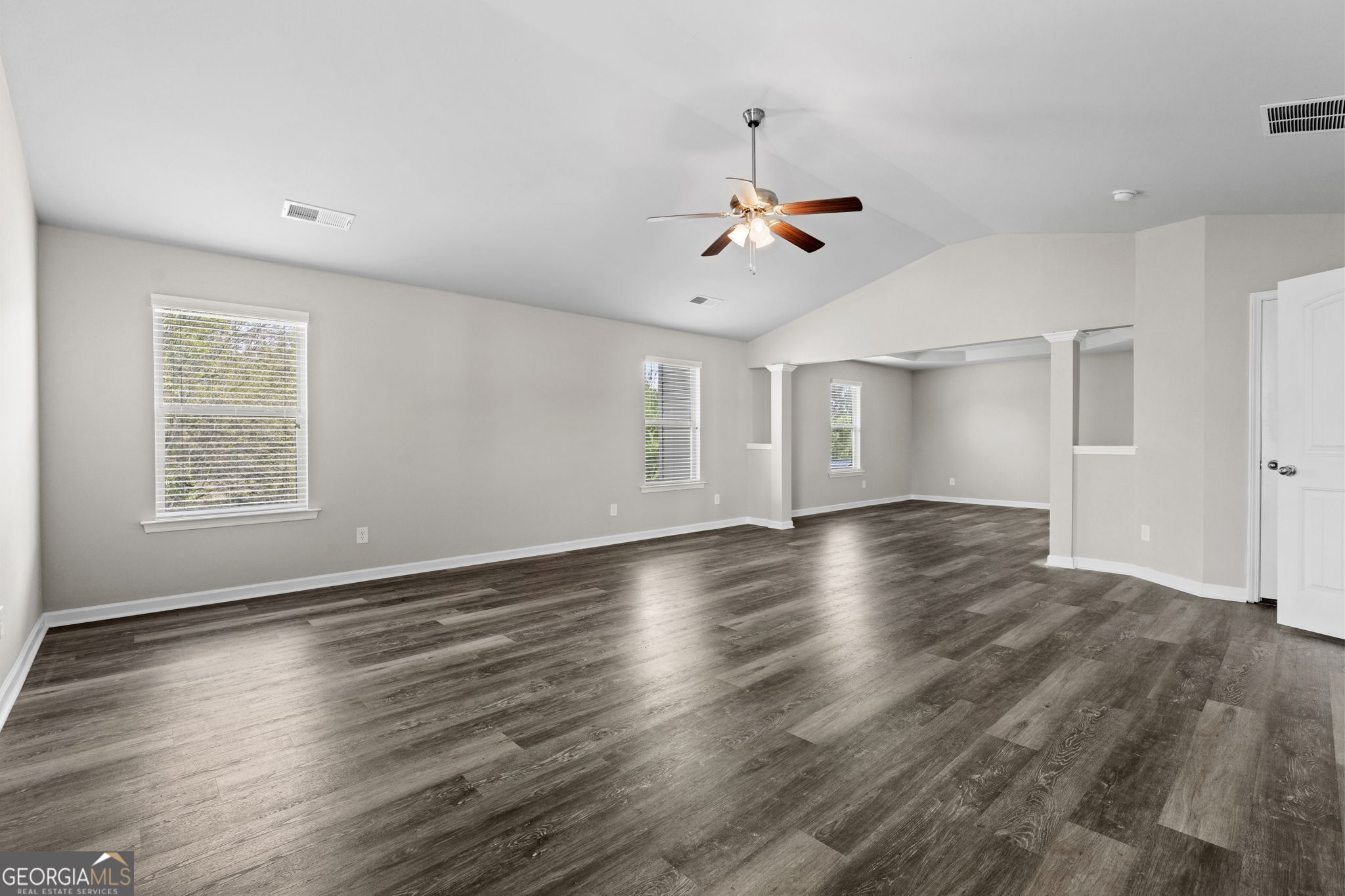 184 Amelia Drive Byron, GA 31008 - Photo 31 of 46 a view of empty room with wooden floor and fan