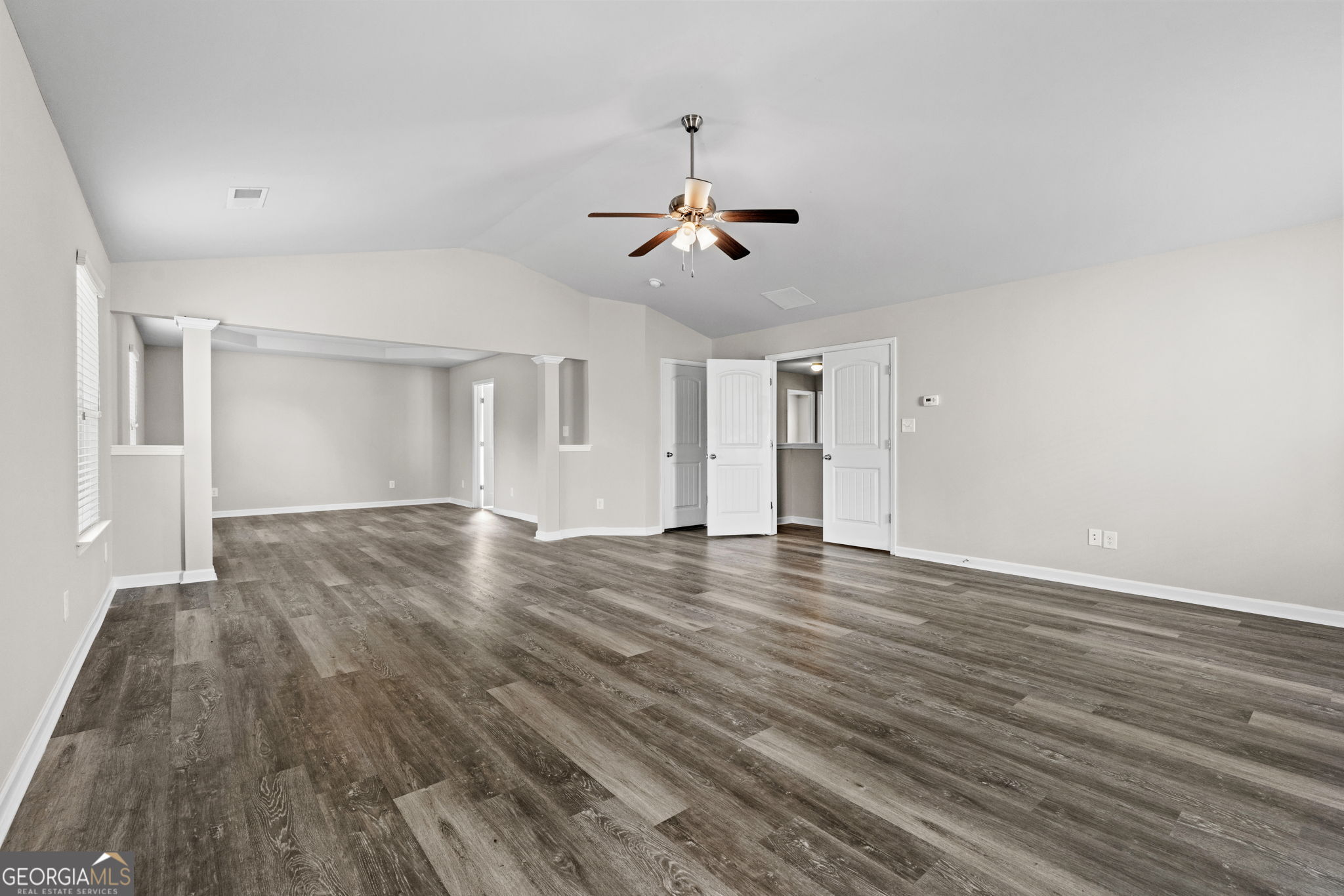 184 Amelia Drive Byron, GA 31008 - Photo 32 of 46 a view of a room with wooden floor and ceiling fan
