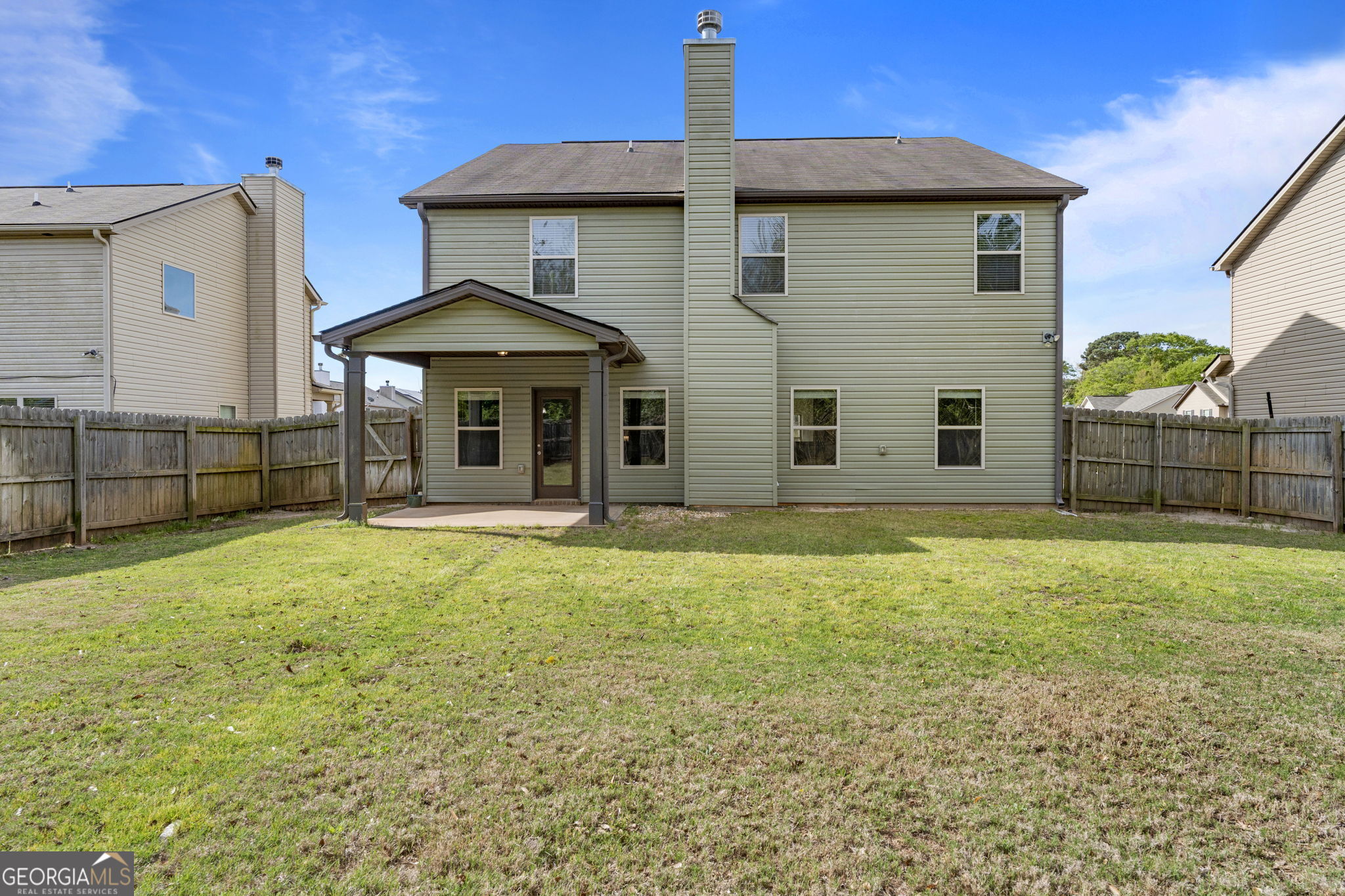 184 Amelia Drive Byron, GA 31008 - Photo 45 of 46 a view of a house with backyard and balcony