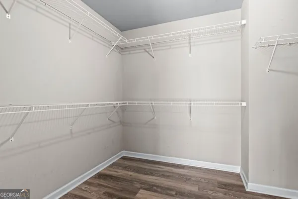 a view of a room with racks on the wall