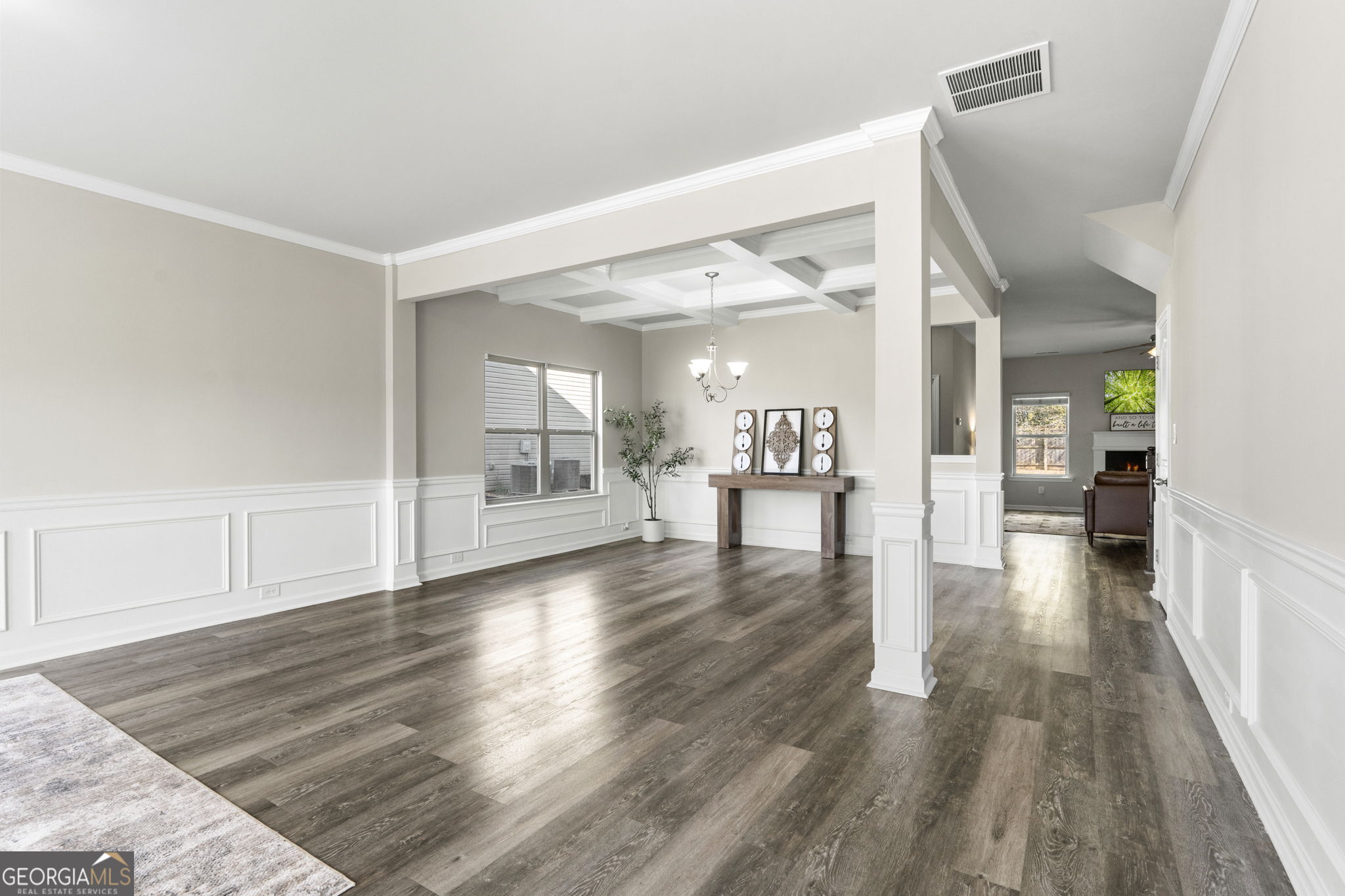 184 Amelia Drive Byron, GA 31008 - Photo 9 of 46 a view of a hallway view with wooden floor and a living room