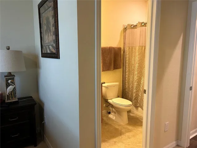 a bathroom with a toilet and a sink