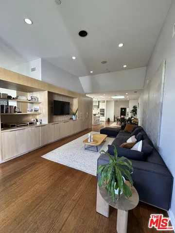 a bathroom with a sink a toilet and a shower