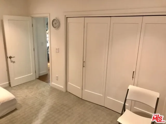 a living room with furniture rug and a couch