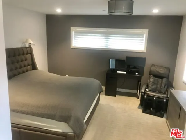 a view of a house with backyard and porch