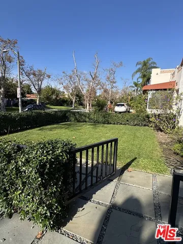 a black and white building with a outdoor space