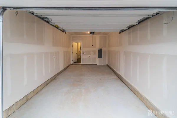 a view of kitchen with wooden floor