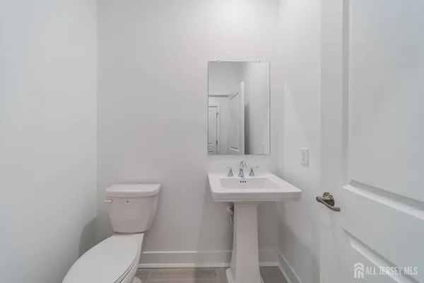 a view of a livingroom with wooden floor
