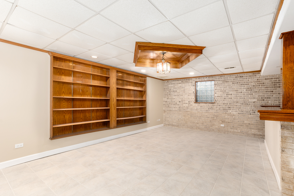 1513 Wood Street Crete, IL 60417 - Photo 20 of 35 a view of an empty room with a window