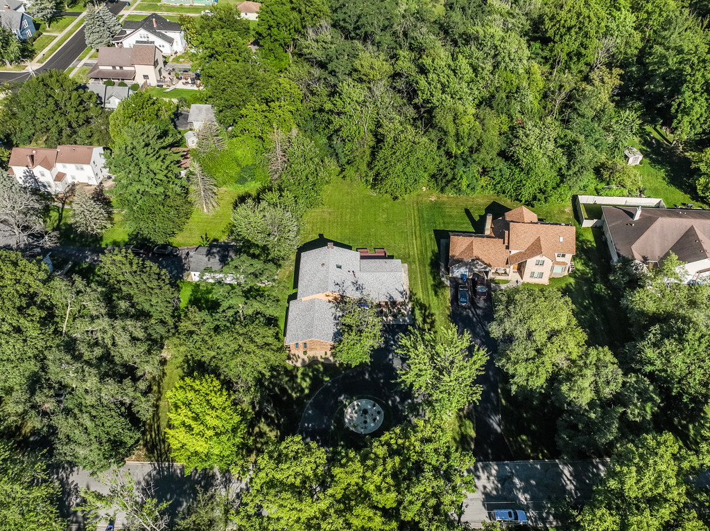 1513 Wood Street Crete, IL 60417 - Photo 29 of 35 an aerial view of a house with a yard and garden