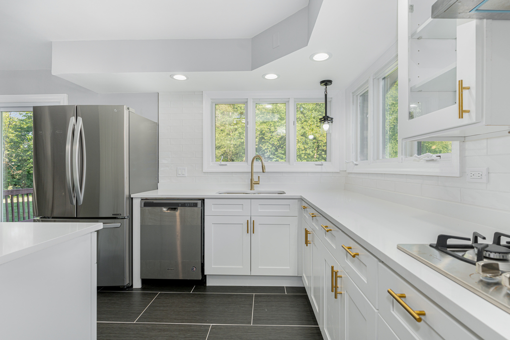 1513 Wood Street Crete, IL 60417 - Photo 5 of 35 a kitchen with a sink stove and refrigerator