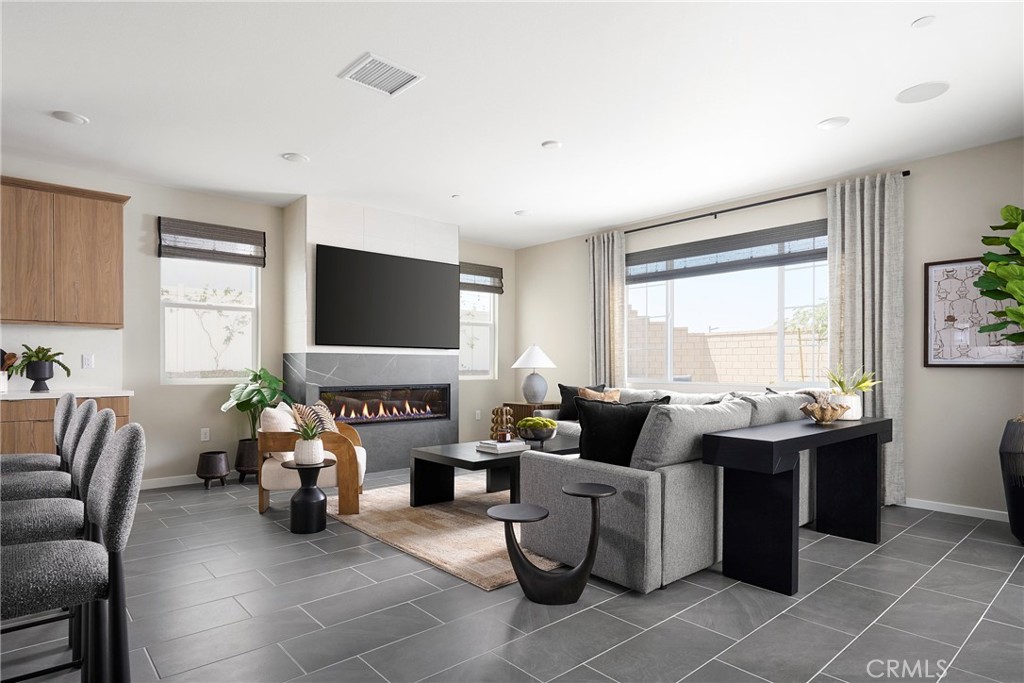 26099 Pepper Tree Ridge Road Corona, CA 92883 - Photo 8 of 16 Model Photos: Photos shown are of the model home for this floor plan. Actual finishes, features, and landscaping may vary.