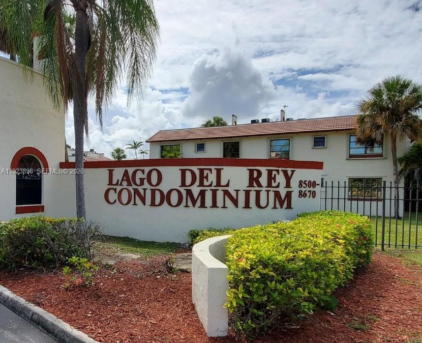 8540 Southwest 149th Avenue, Unit 815 Miami, FL 33193 - Photo 1 of 16 a sign on the side of the road